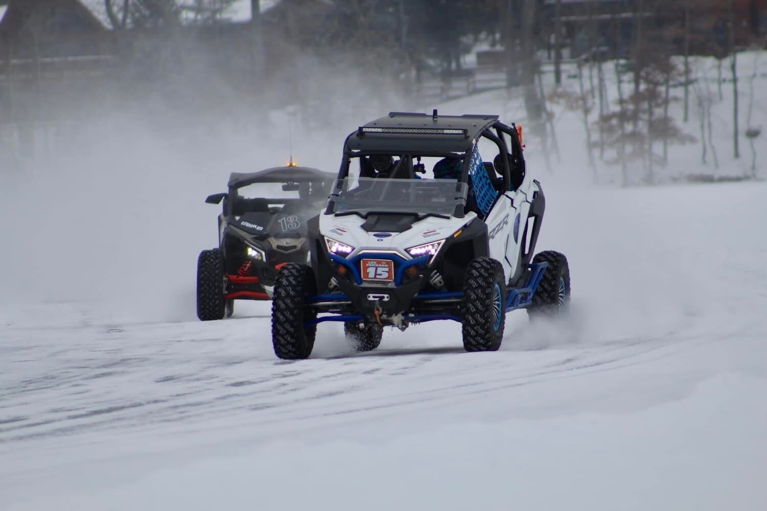 Lou's Pro XP #15 racing another car on the ice
